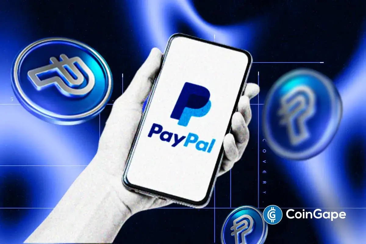 PayPal logo displayed on phone with PYUSD stablecoin icons.