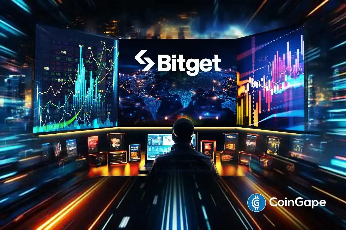 Analyst monitors Bitget’s global trading dashboard showing institutional volume and market data growth.
