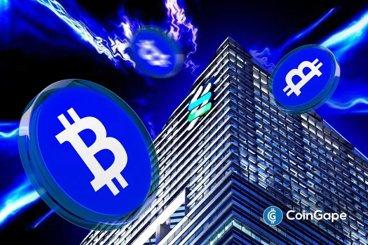 Bitcoin symbols hover over Standard Chartered building, highlighting bank’s bullish $200,000 forecast.