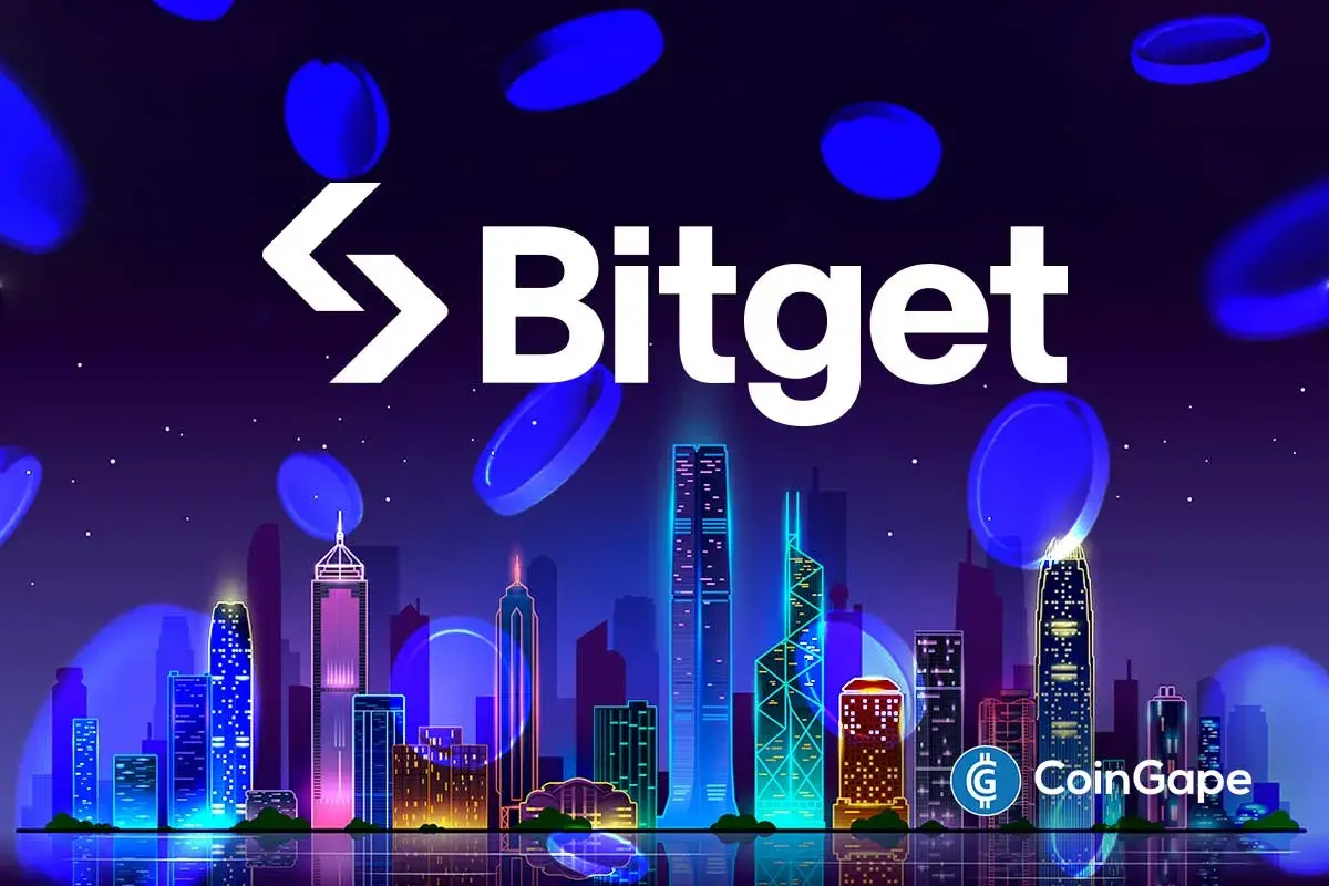 Bitget logo above a stylized Hong Kong skyline, reflecting the exchange’s support for communities after the recent tower fire.