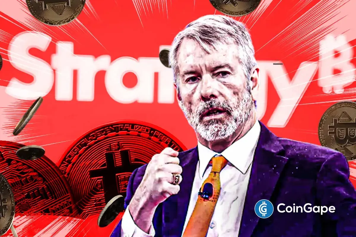 Michael Saylor speaks against a Bitcoin-themed backdrop as Strategy's holdings face renewed scrutiny amid market volatility.