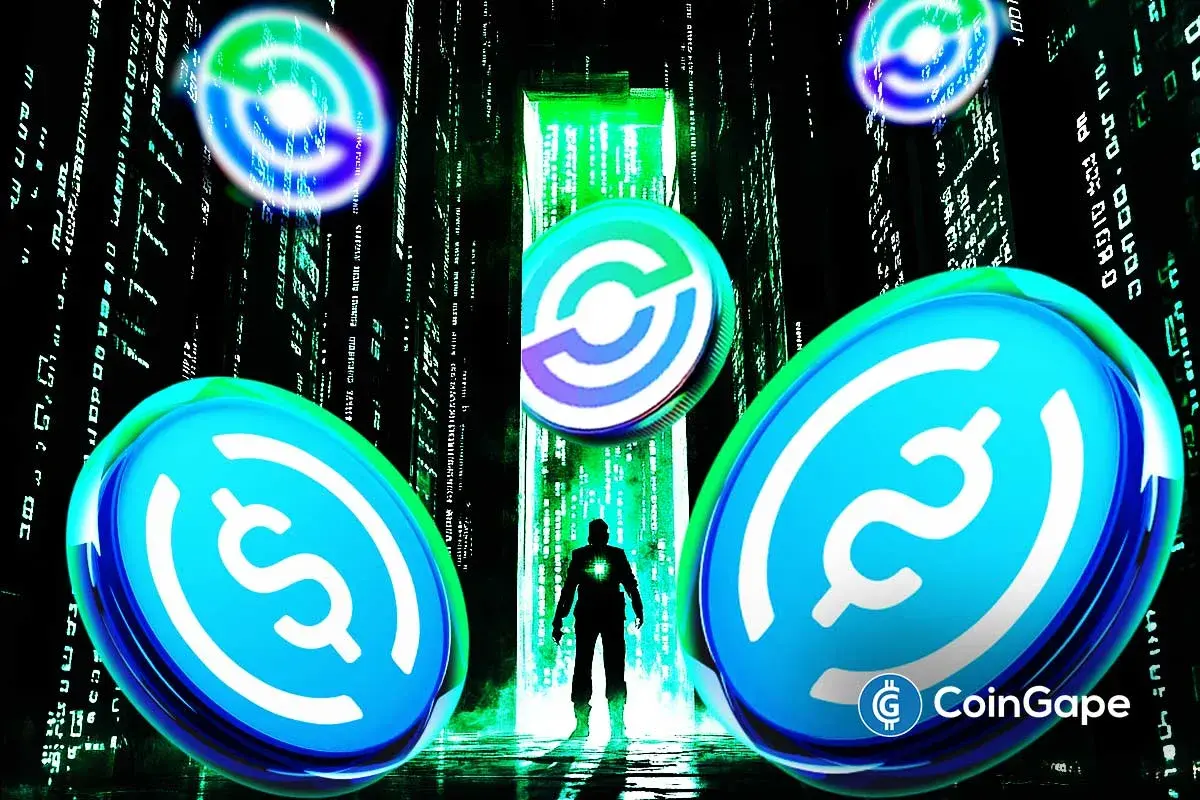 USDC tokens float in a digital matrix background as Circle highlights USDCx privacy features on the Aleo blockchain.